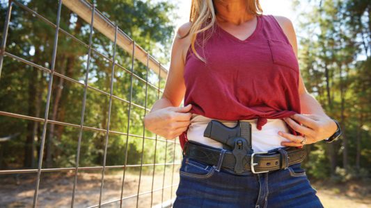 woman with appendix carry concealed holster and handgun