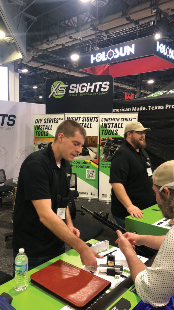 XS Sights booth at trade show.